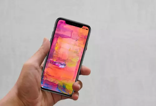 iPhone XS PSD mockup in hand