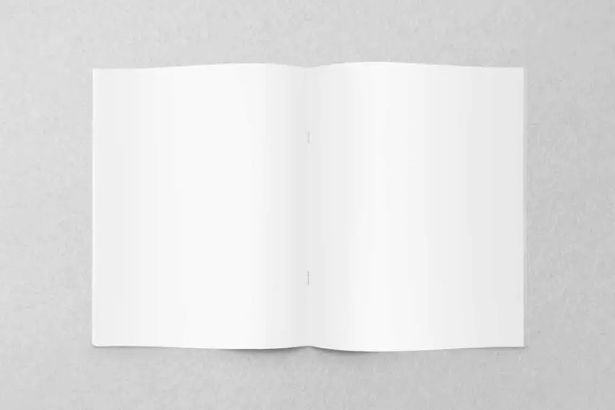 Download PSD mockup of a notebook page spread