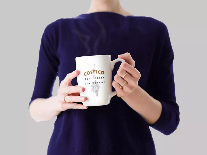 Download Mockup of a girl with a mug of coffee in her hands