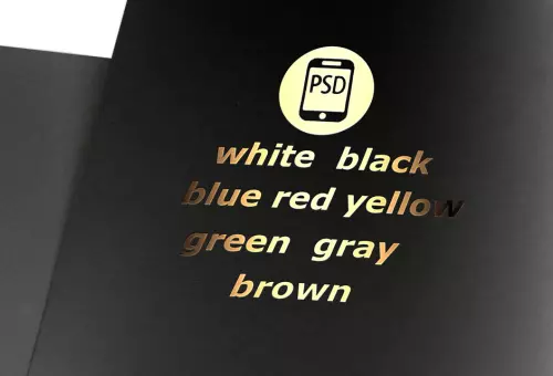 PSD mockup of golden lettering on a black surface