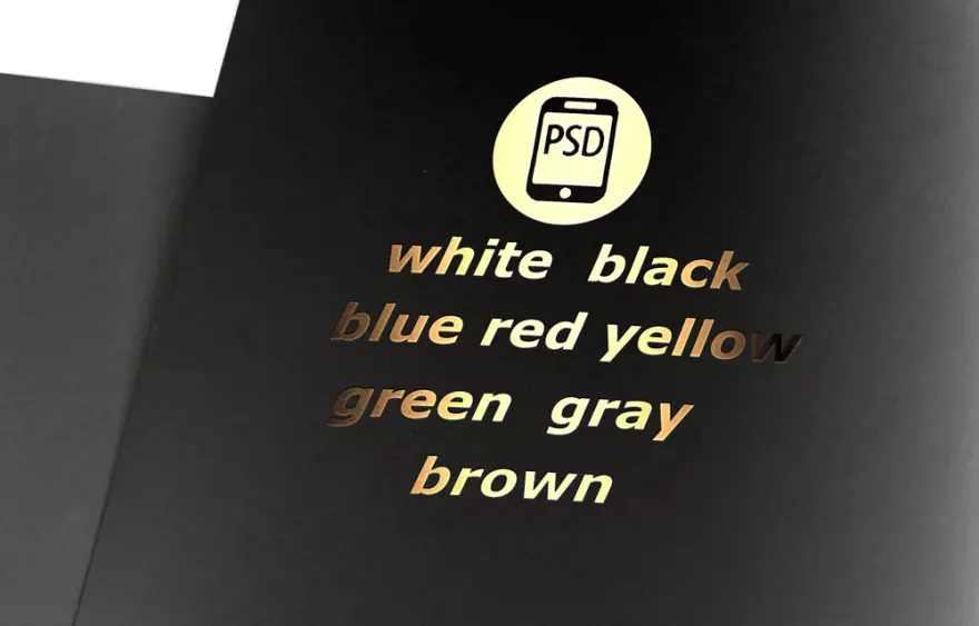 Download PSD mockup of golden lettering on a black surface