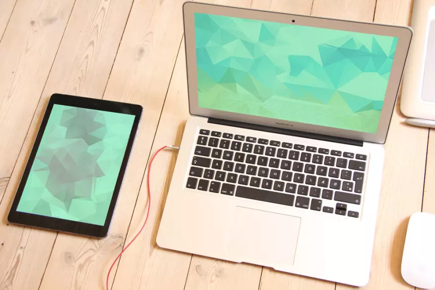 Download Macbook and tablet PSD mockup on wooden table