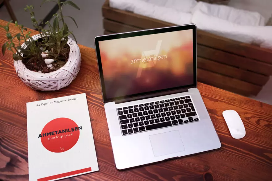 Download PSD mockup of macbook and sheet on the table