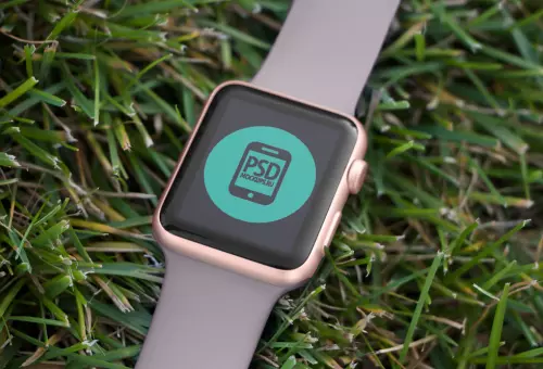 Watch PSD mockup in a grass