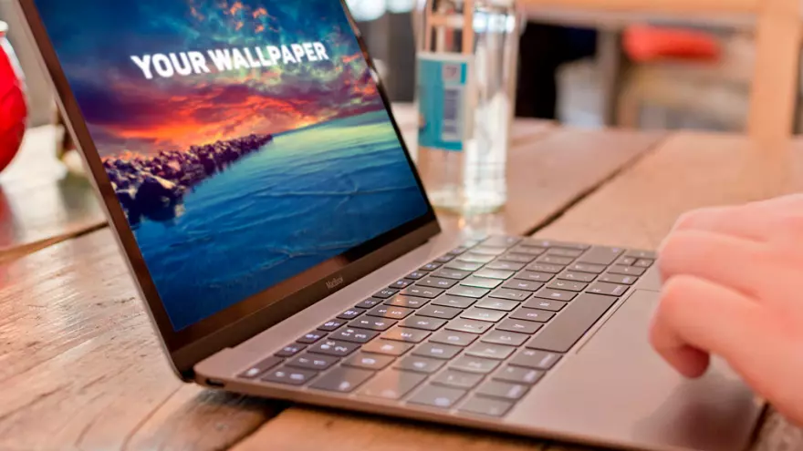 Download MacBook with sea image PSD mockup