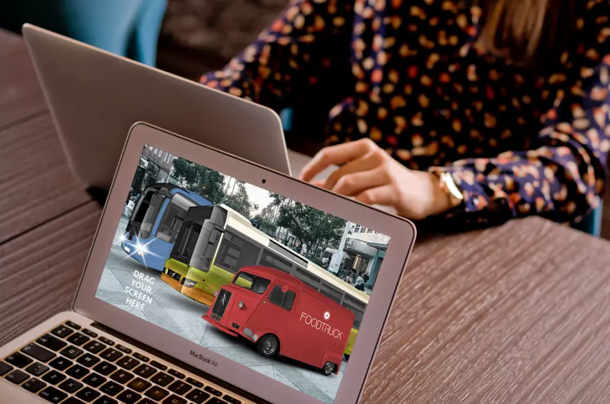 Download Laptop with transport on display PSD mockup