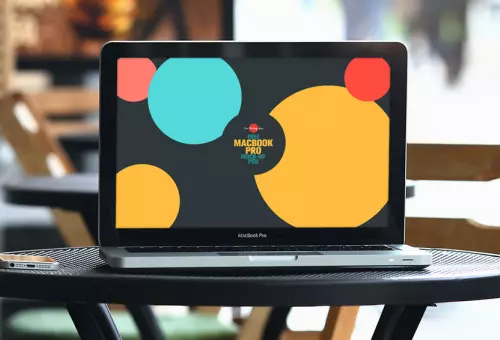 Notebook with colorful circles PSD mockup