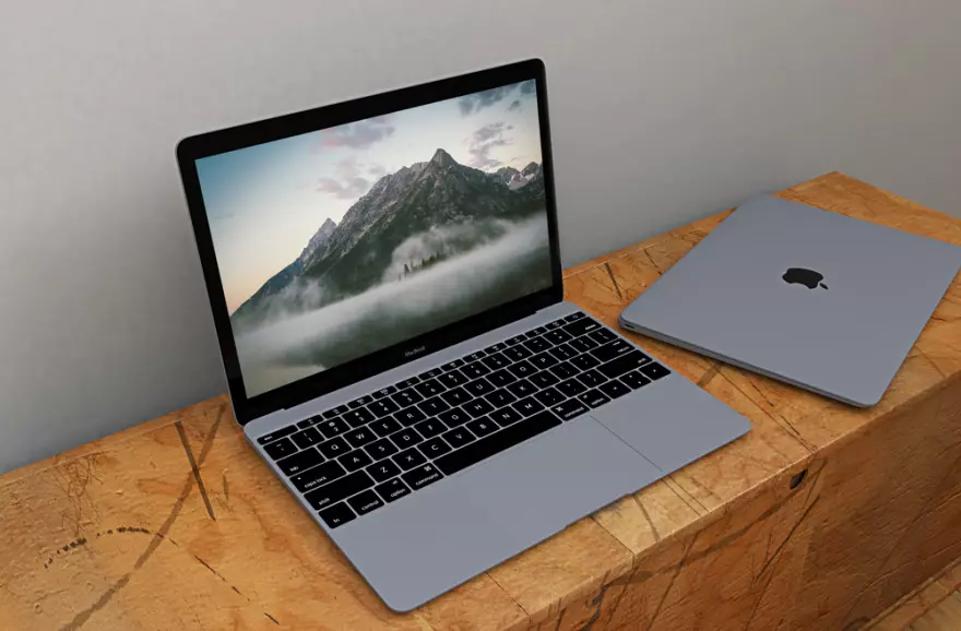 Download MacBook on a wooden surface