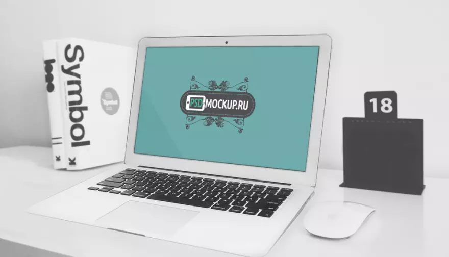 Download MacBook with a pattern on the screen PSD mockup