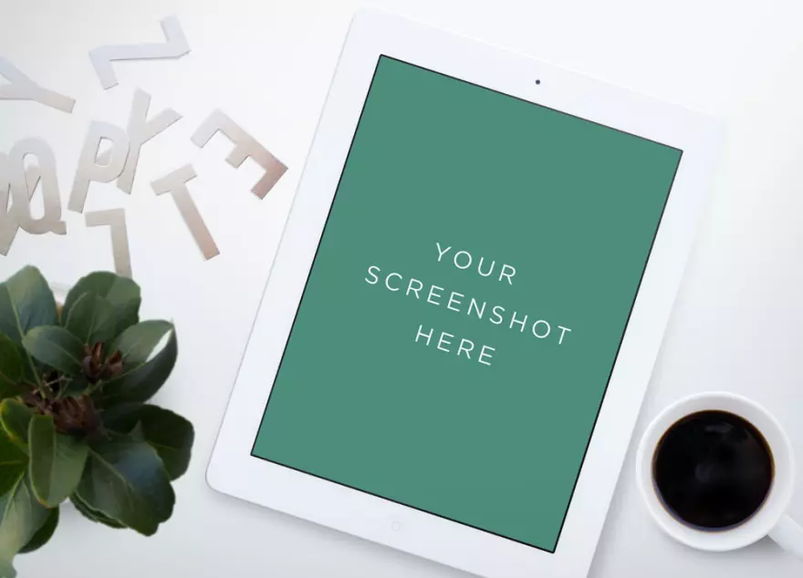 Download iPad with flower, letters and cup (PSD mockup)