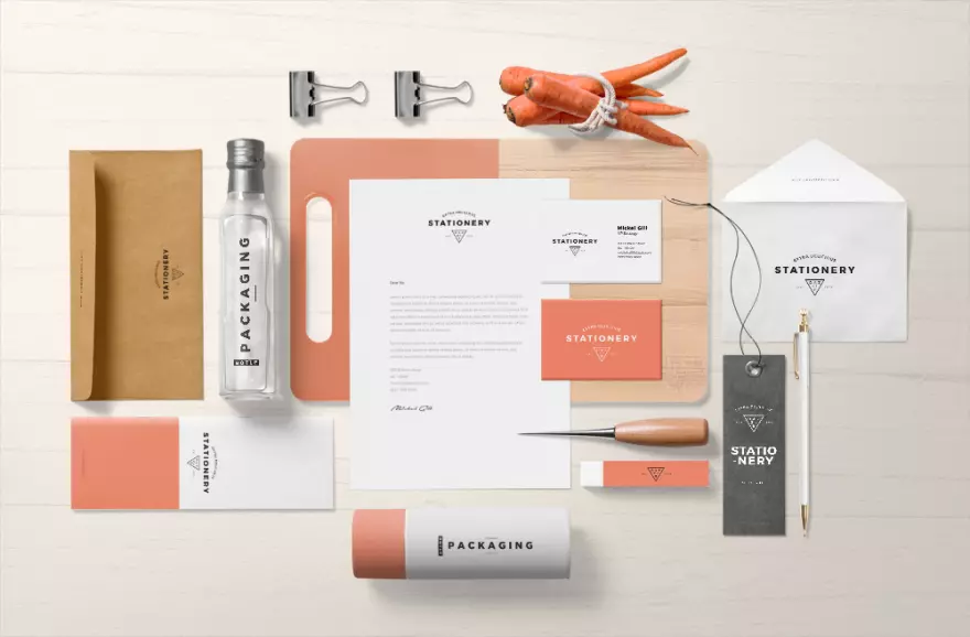 Download Brand identity elements with a carrot PSD mockup
