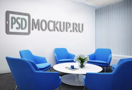 Logo mockup on office wall with blue armchairs